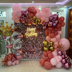 Birthday balloon decoration with rose gold sequin wall, crown balloon and number 8 standee in Indore