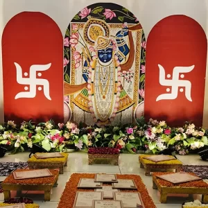 Chhathi Puja red Shrinathji flower decoration with Swastik panels and flower mandap in Indore