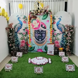 Chhathi Puja Shrinathji peacock decoration with custom backdrop and flower arrangements in Indore