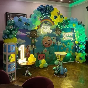 Cocomelon blue first birthday theme decoration with BABY blocks number 1 light and blue green yellow balloons Indore