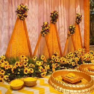 Colorful carnival theme decoration with rainbow balloons striped backdrop and festive props in Indore