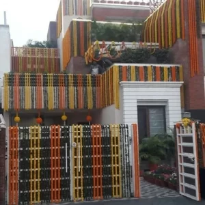 Orange yellow marigold garland home gate and building decoration for wedding or event