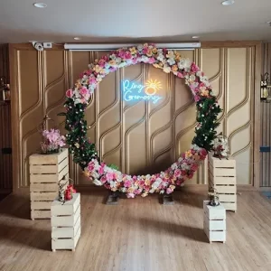 Floral ring wreath ring ceremony decoration with Ring Ceremony neon signage and rustic wooden crate stands in Indore
