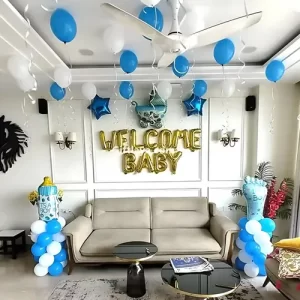 baby gold foil balloon home decoration with ceiling balloons and balloon pillars in living room Indore